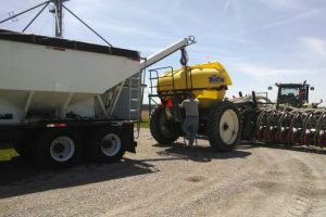 fertilizer into strip tiller